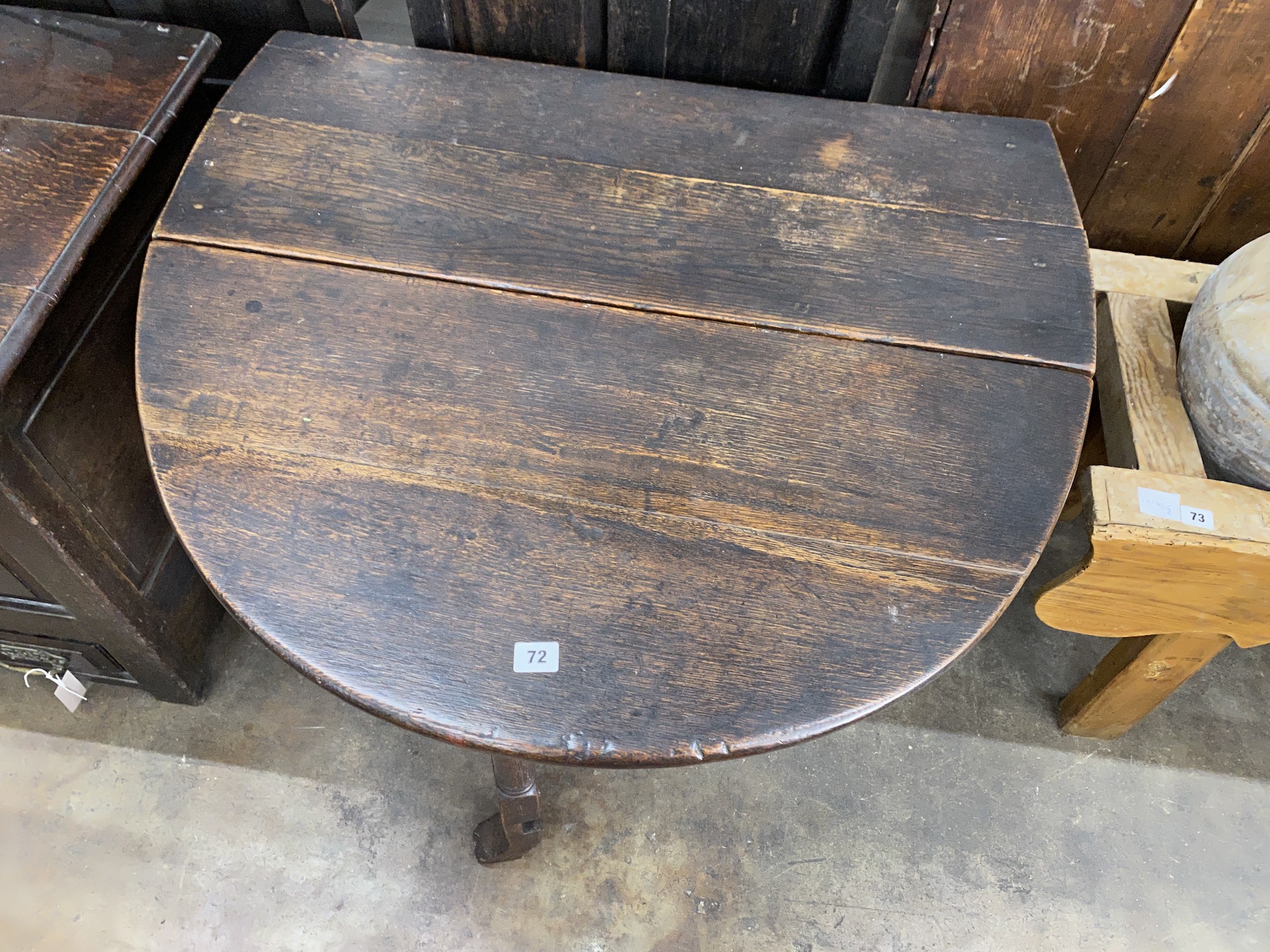 A small 18th century oak gateleg table, width 90cm, length 118cm extended, height 70cm